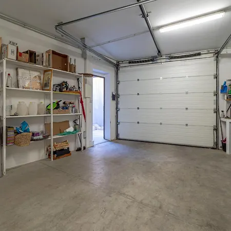 House In Roses Near Canyelles * Montjoi